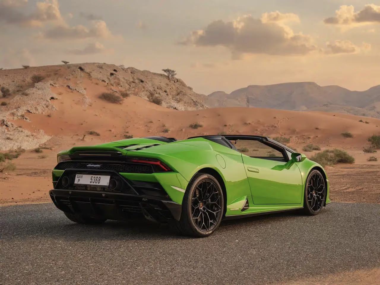 Green Lamborghini Huracan Evo Spyder Rental in Dubai