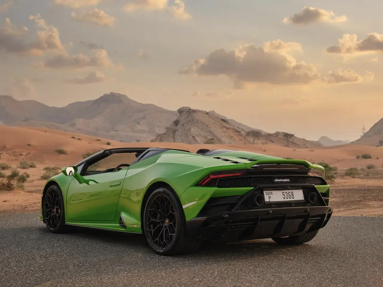 Green Lamborghini Huracan Evo Spyder Rental in Dubai