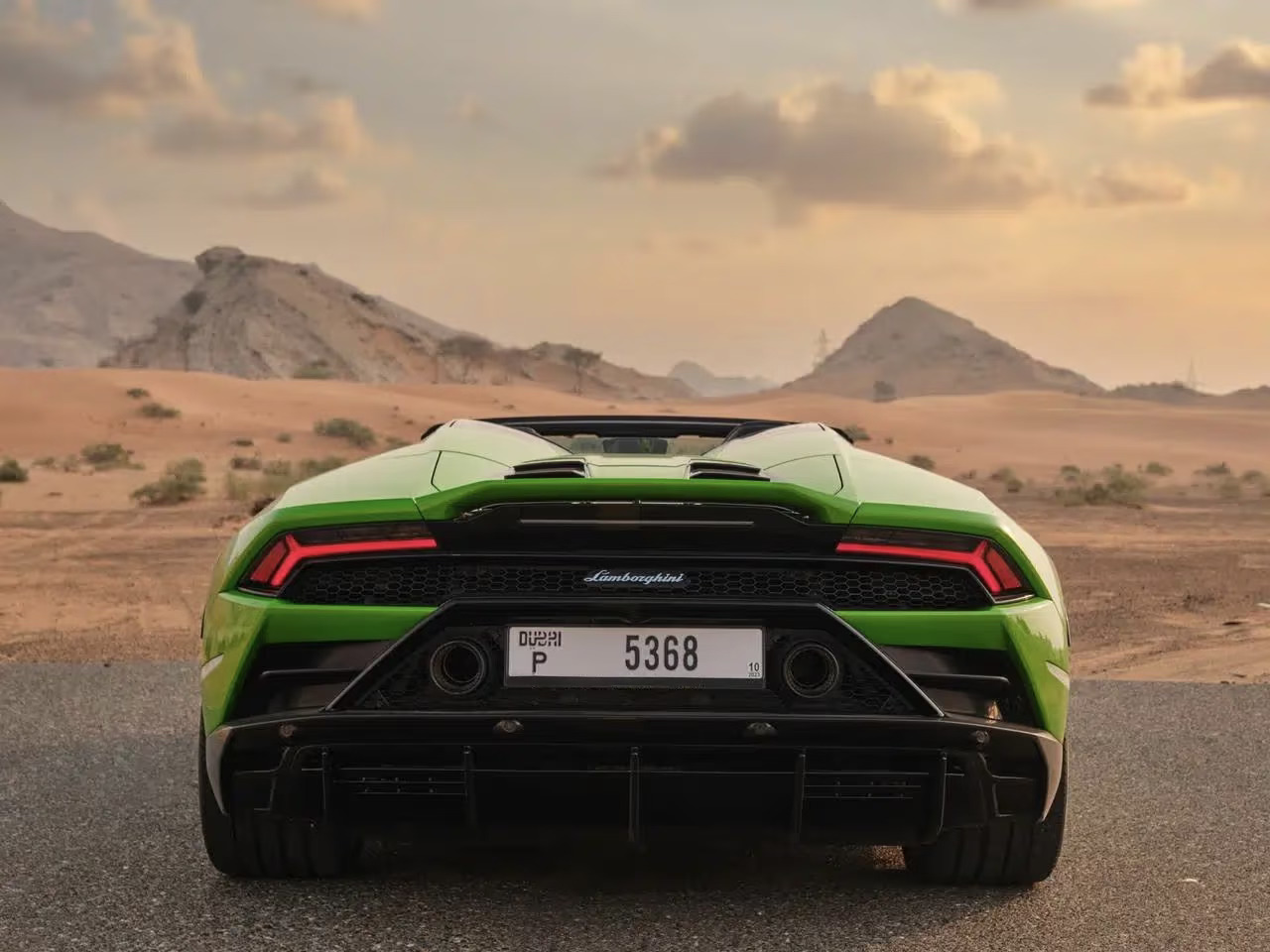 Green Lamborghini Huracan Evo Spyder Rental in Dubai