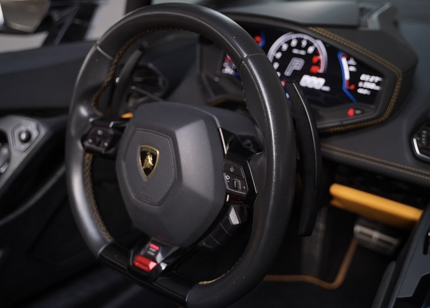 Rent a White Lamborghini Huracan Evo Spyder in Dubai