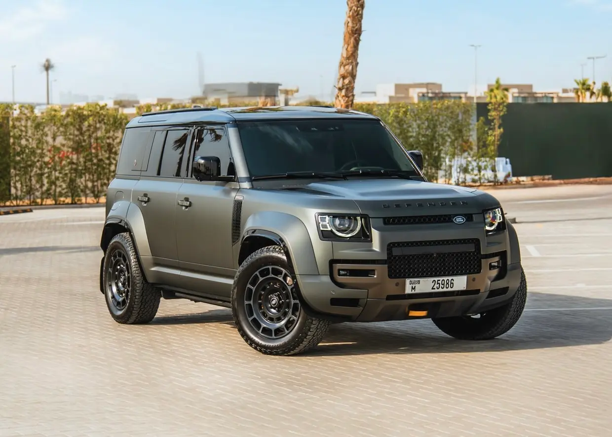 Land Rover Defender OCTA Rental Dubai: The Super Sport Experience Matte green Land Rover Defender OCTA in the Super Sport collection