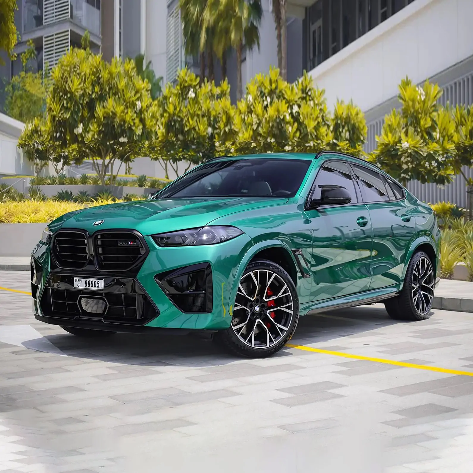Green BMW X6 M Competition rental in Dubai