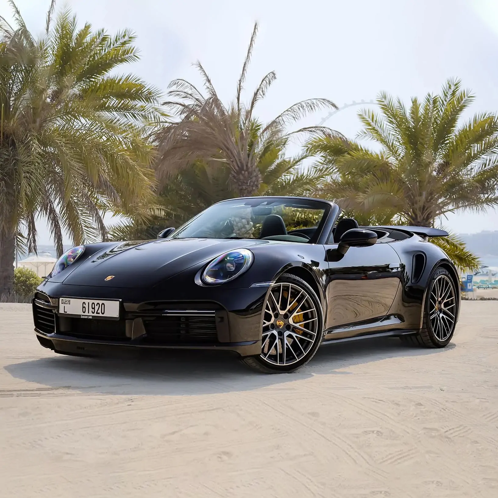 Black Porsche 911 Turbo S Cabriolet rental in Dubai